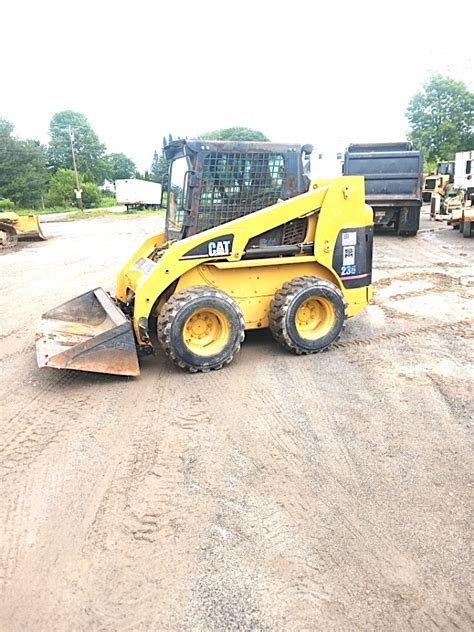 cat skid steer bucket release switch|cat 236 skid steer problems.